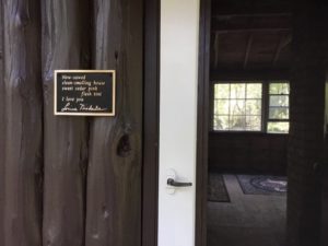 Image of poem plaque installed next to the cabin door